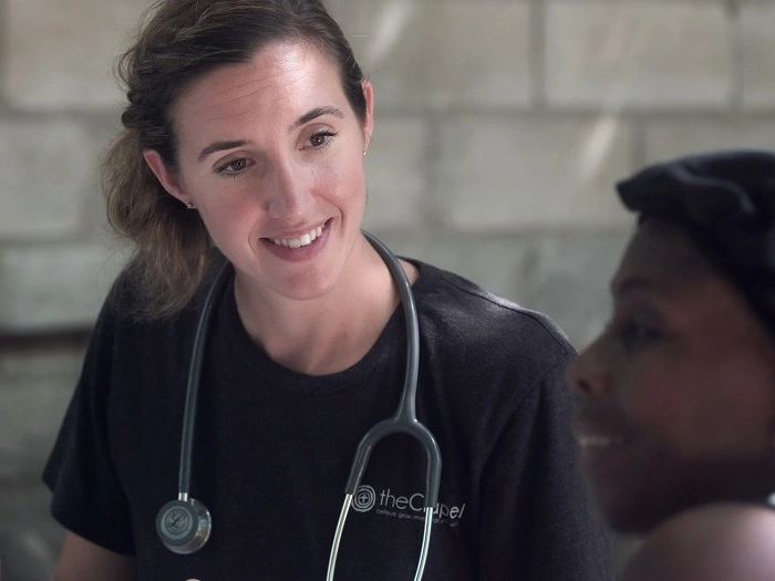 pharmacist listening to patient